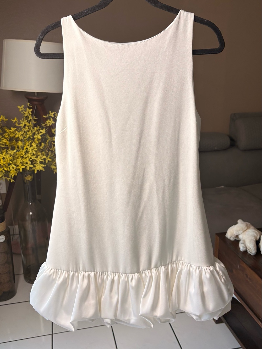Women's Cream Ruffle-Hem Sleeveless Top